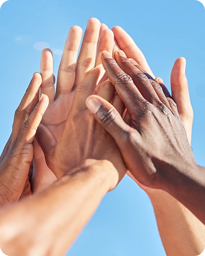 Hands all together to show community