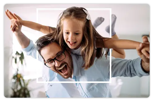 Father and daughter playing in their home
