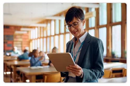An individual reading a tablet