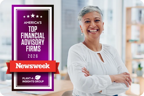Woman smiling in office with Top Financial Advisory Firms Award overlaid on image