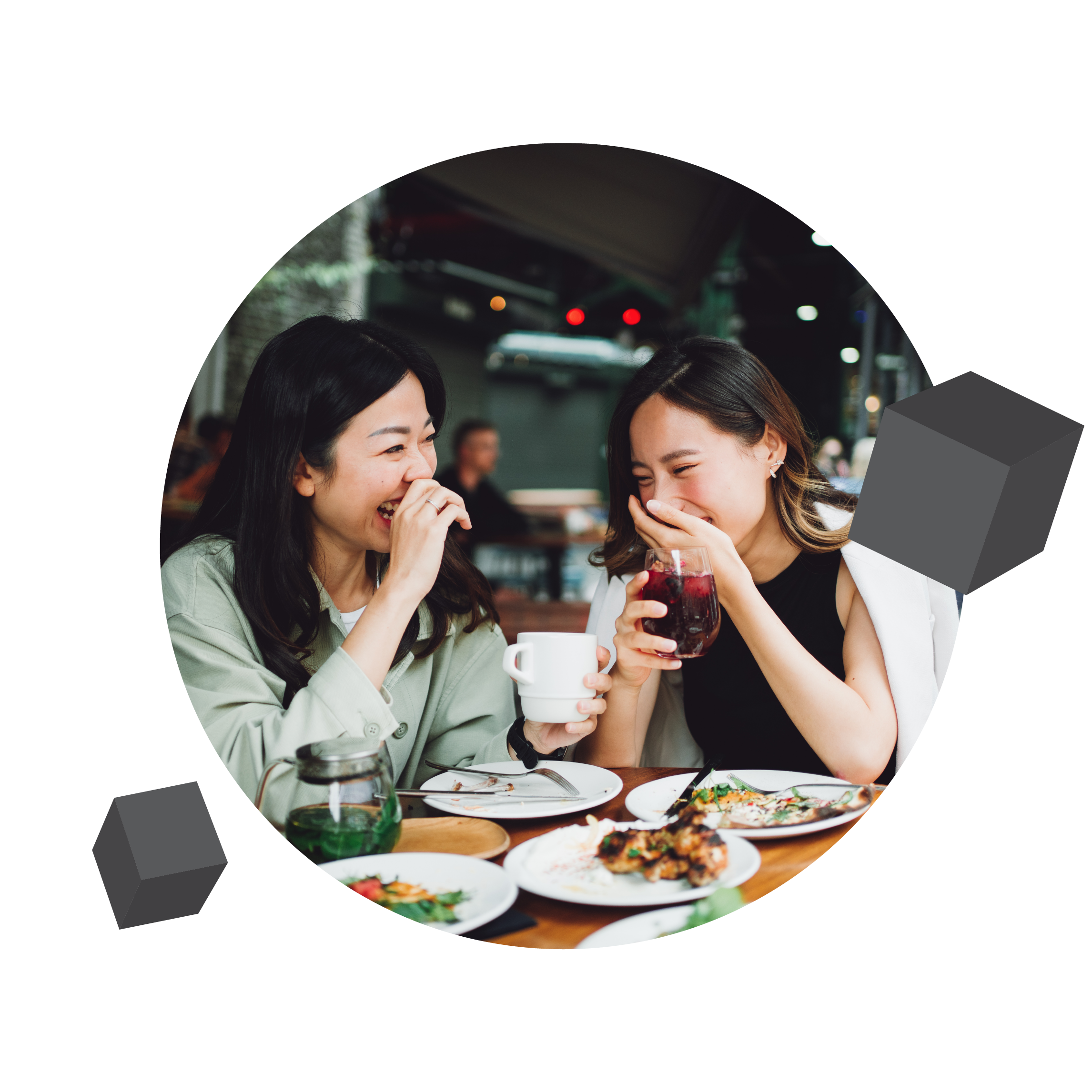 two women eating lunch and laughing