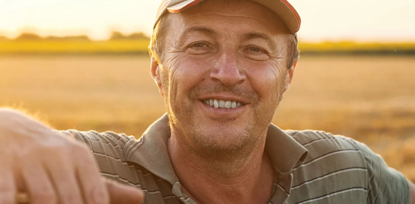 Farmer smiling